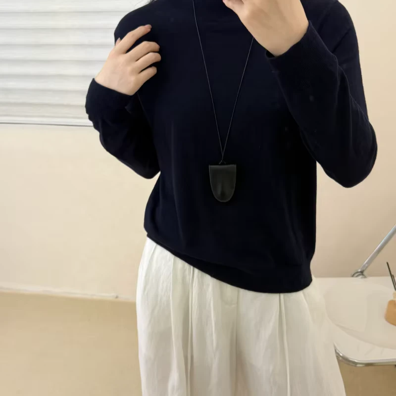Soft semi high neck sweater with a slimming pullover and long sleeved knitted top for autumn and winter